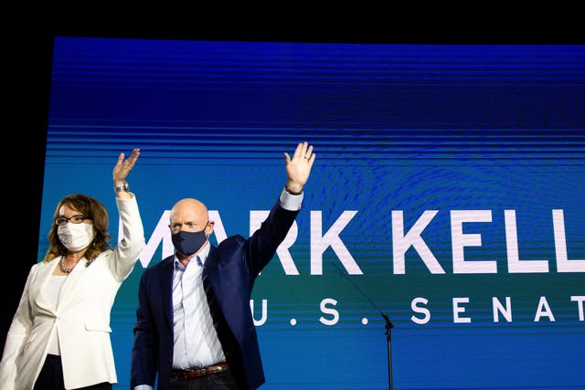 <p>Mark Kelly and Gabrielle Giffords on the night of his victory in Arizona</p>