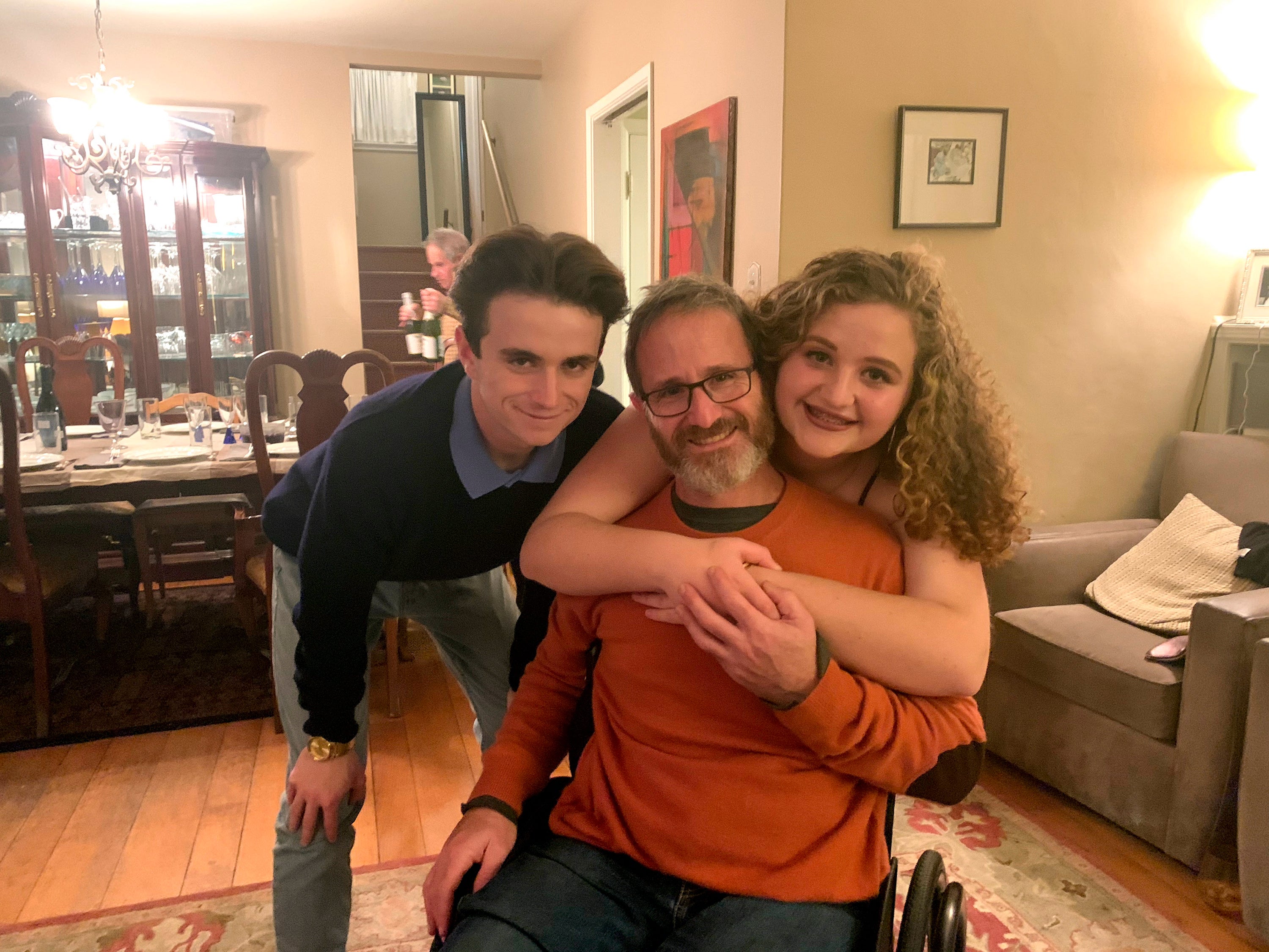 Samuel Kolb, seated, with his son Jacob and daughter Lexi