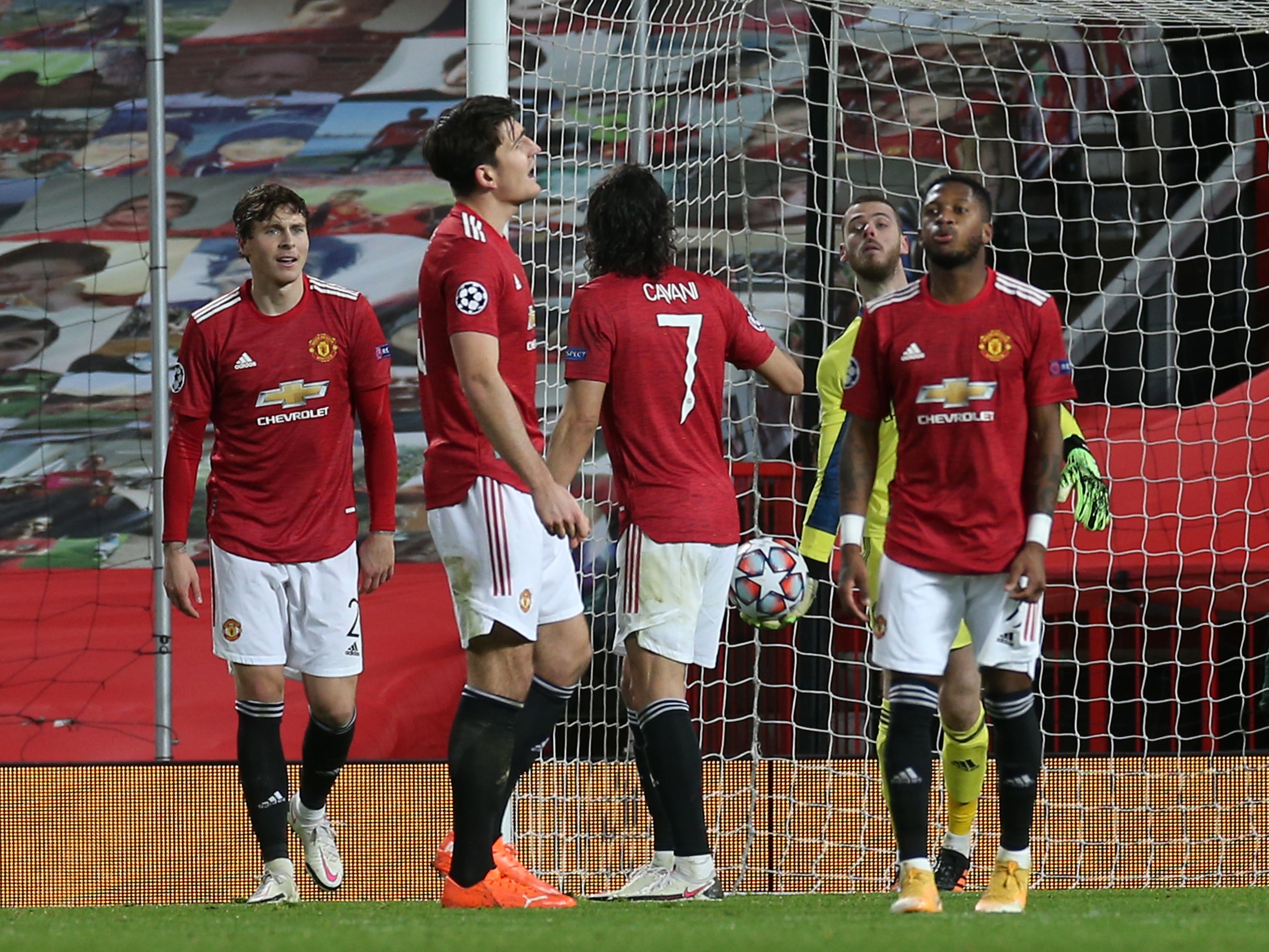 Manchester United players react after conceding in Paris
