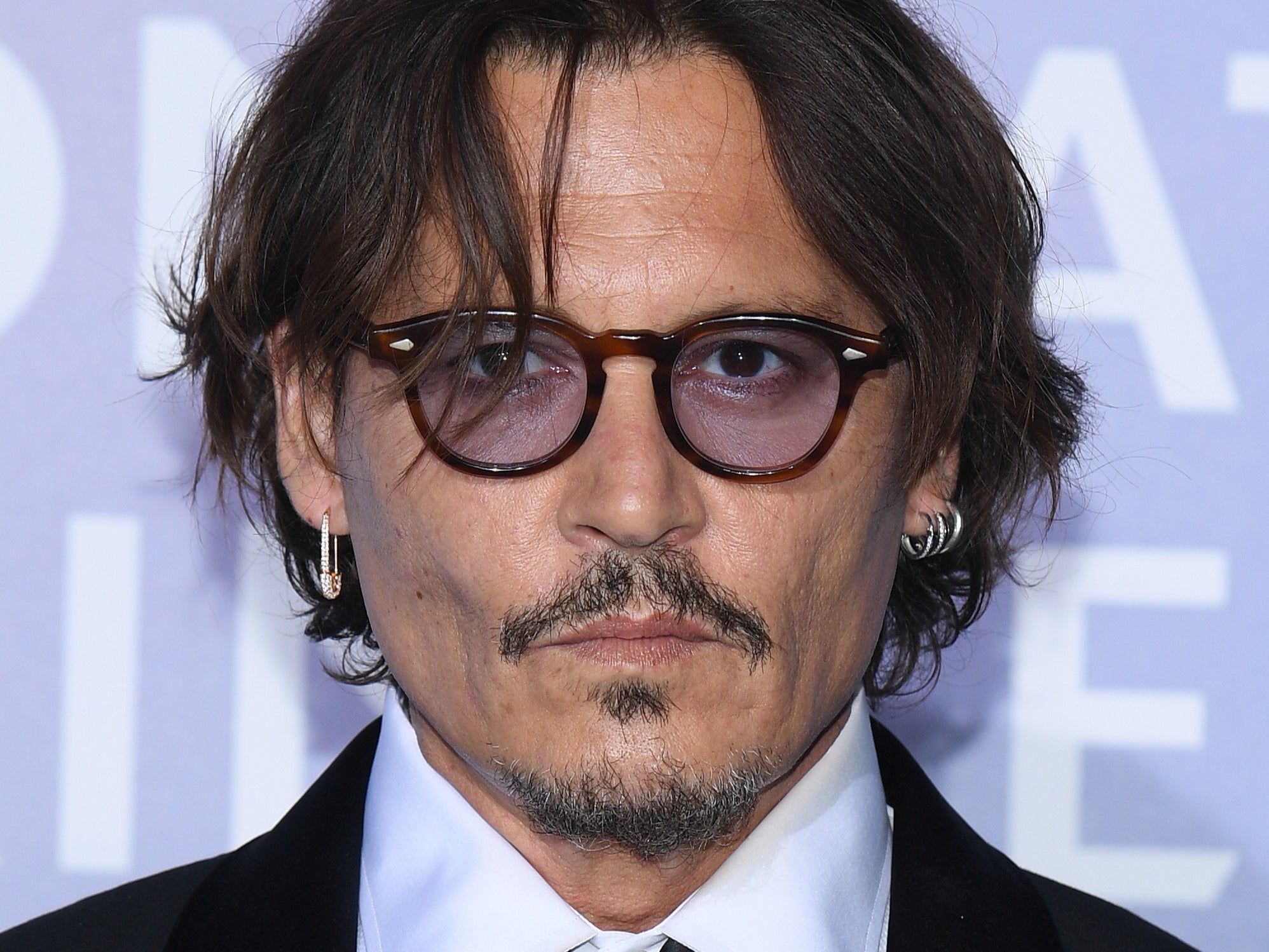 Johnny Depp resigned from ‘Fantastic Beasts’ at the request of Warner Bros