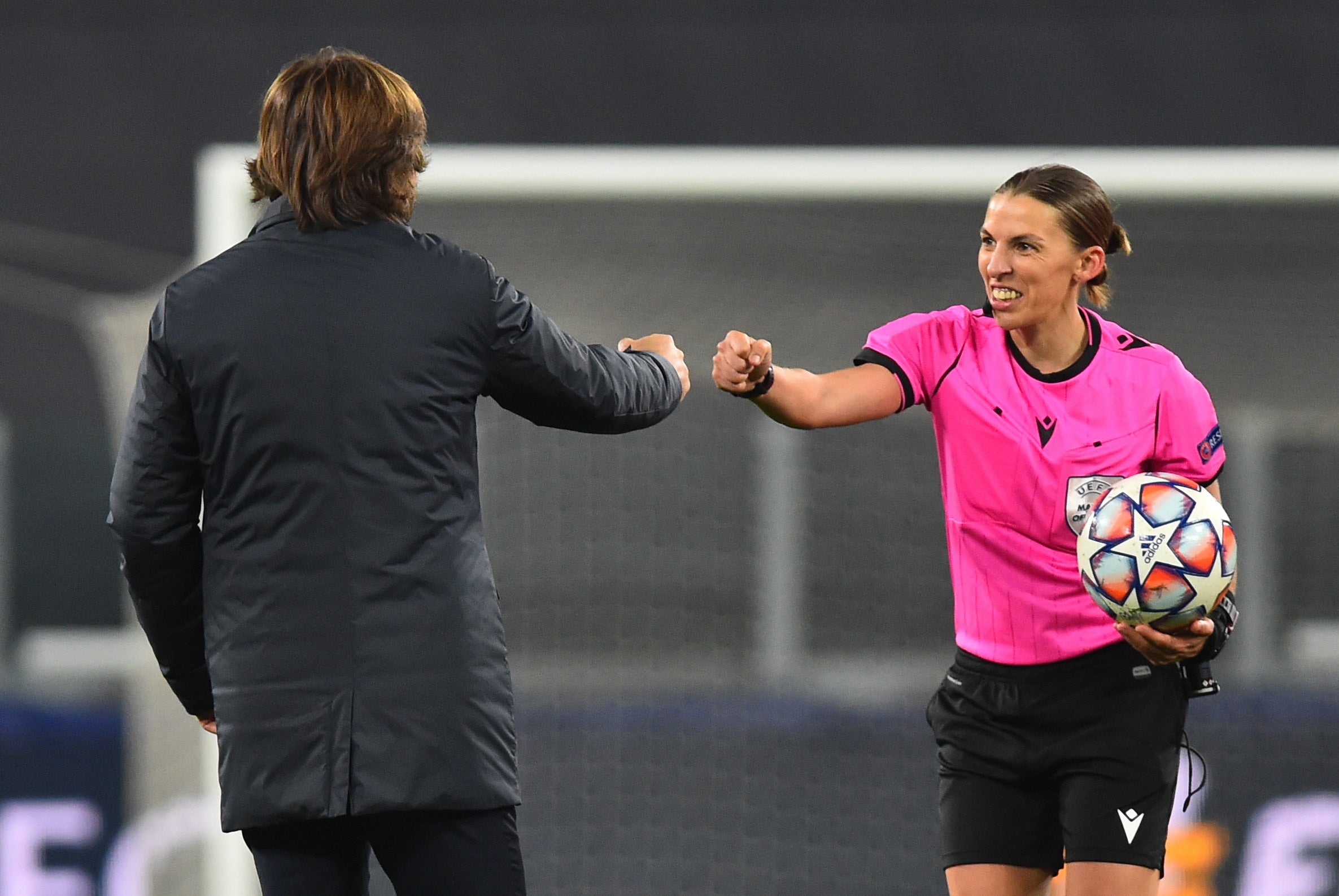 Referee Stephanie Frappart and Juventus coach Andrea Pirlo at the end of the match