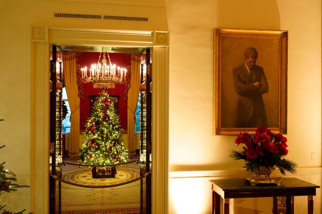 JFK’s portrait hangs outside the Red Room of the White House, but this year the image is also on Christmas tree decorations in the Vermeil Room