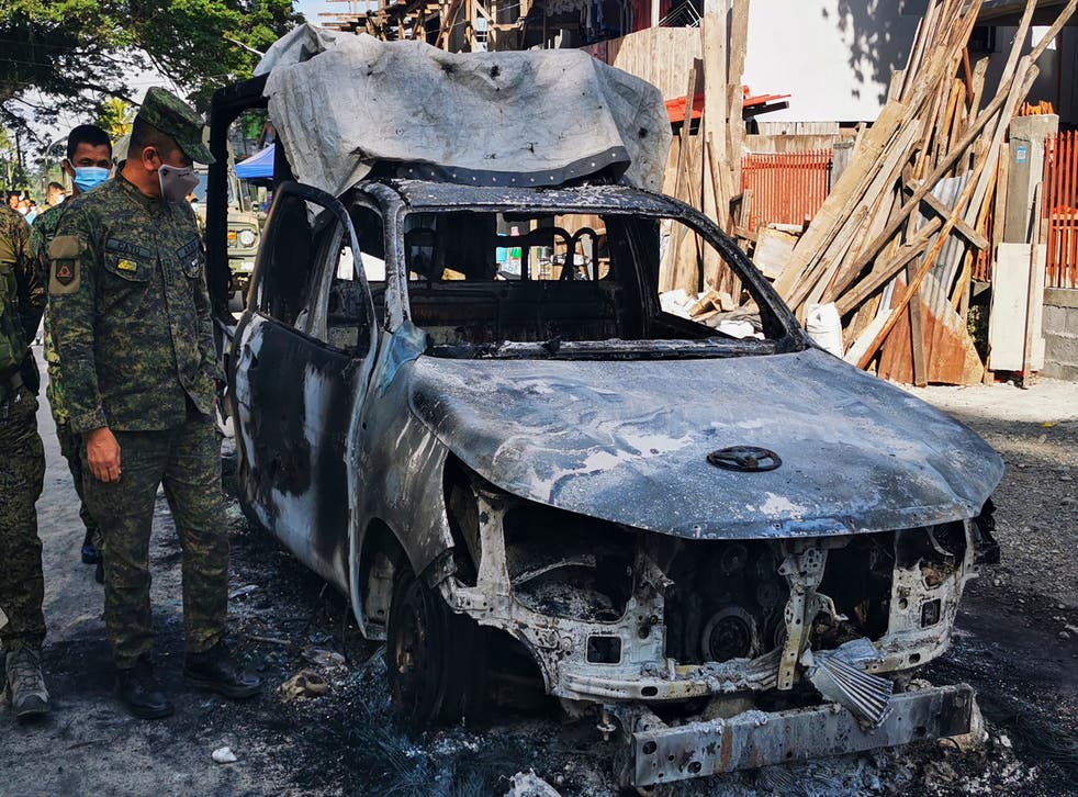 Militants open fire and burn police car in Philippine town militants ...