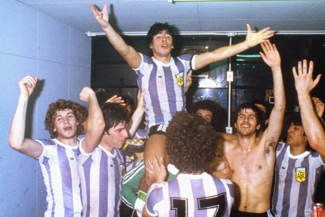 Diego Maradona celebrates with teammates