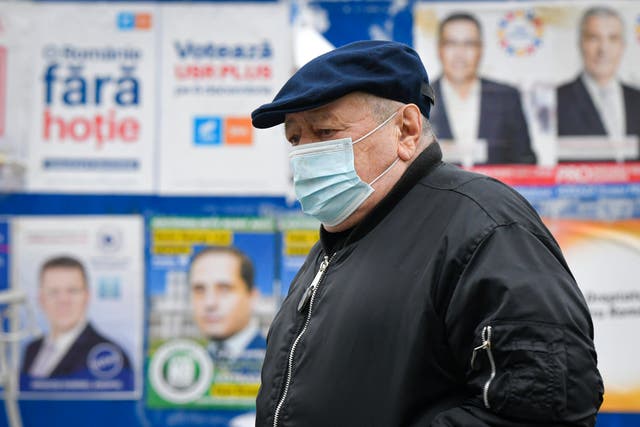 Virus Outbreak Romania Elections