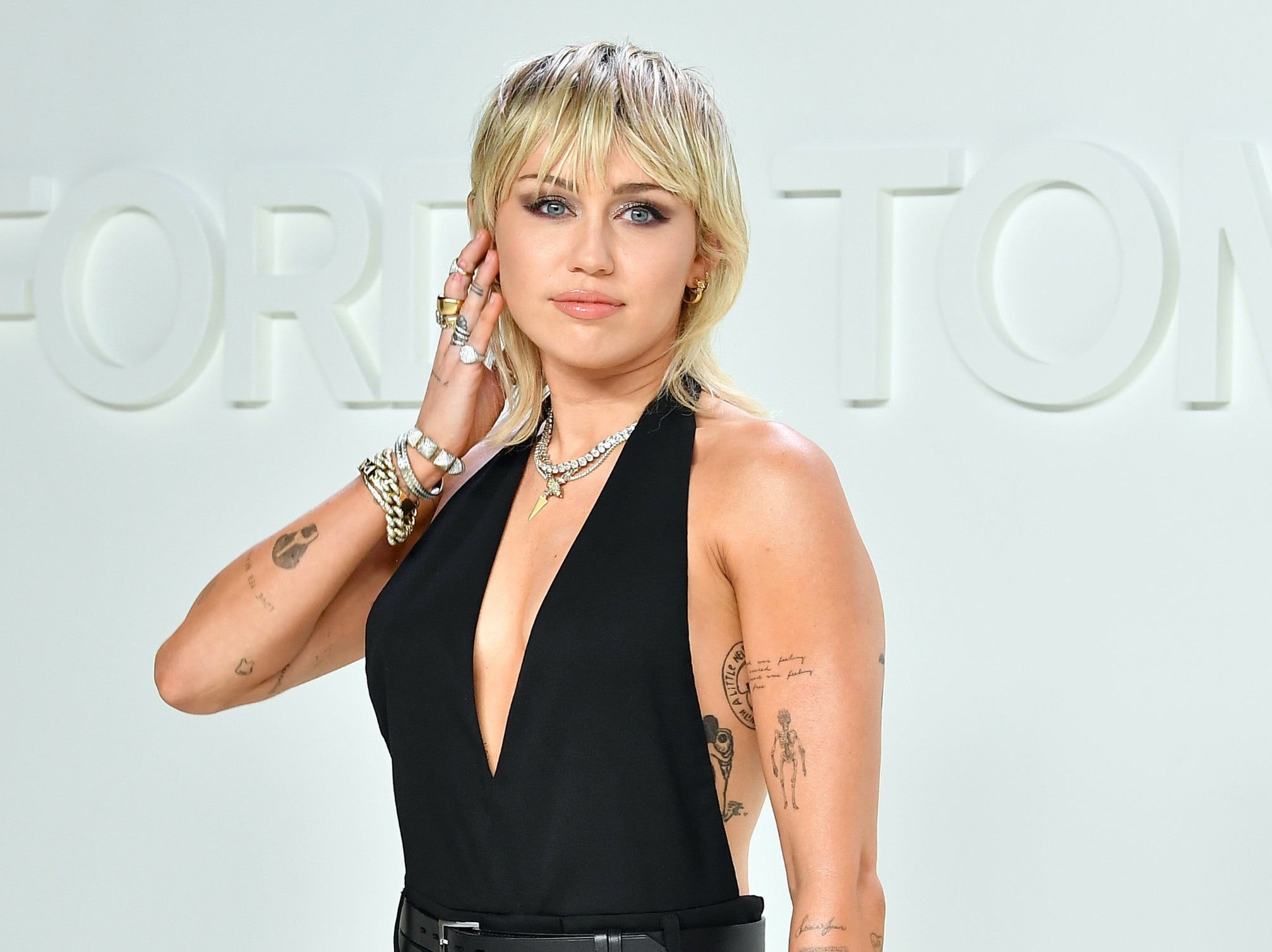 Miley Cyrus says she feels 'trauma' from intense scrutiny over her sexuality as a teenager - The Independent