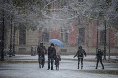 The Latest: Oregon doc's anti-mask comment draws suspension