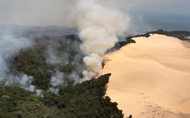 In this handout image provided by Queensland Fire and Emergency Services (QFES), bushfires continue to burn on November 30, 2020 on Fraser Island, Australia.