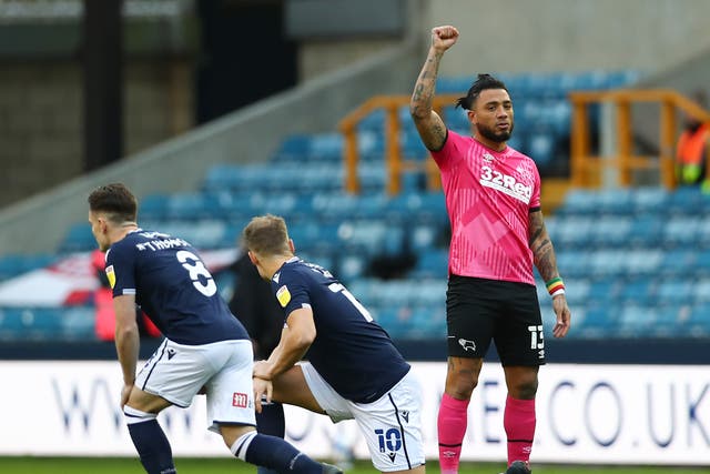 Millwall and Derby County players were booed by fans for taking the knee