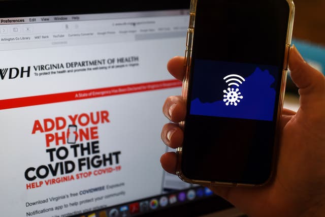 <p>Covidwise logo displayed on a mobile phone screen on 6 August, 2020, in Arlington, Virginia, amid the coronavirus pandemic.</p>