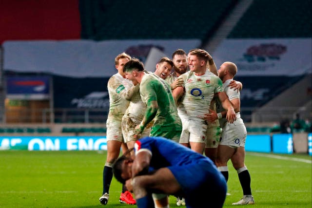 England players celebrate with captain Owen Farrell