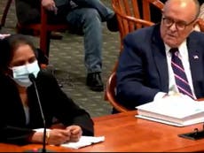 Giuliani asked a woman at the Michigan hearing to remove her mask