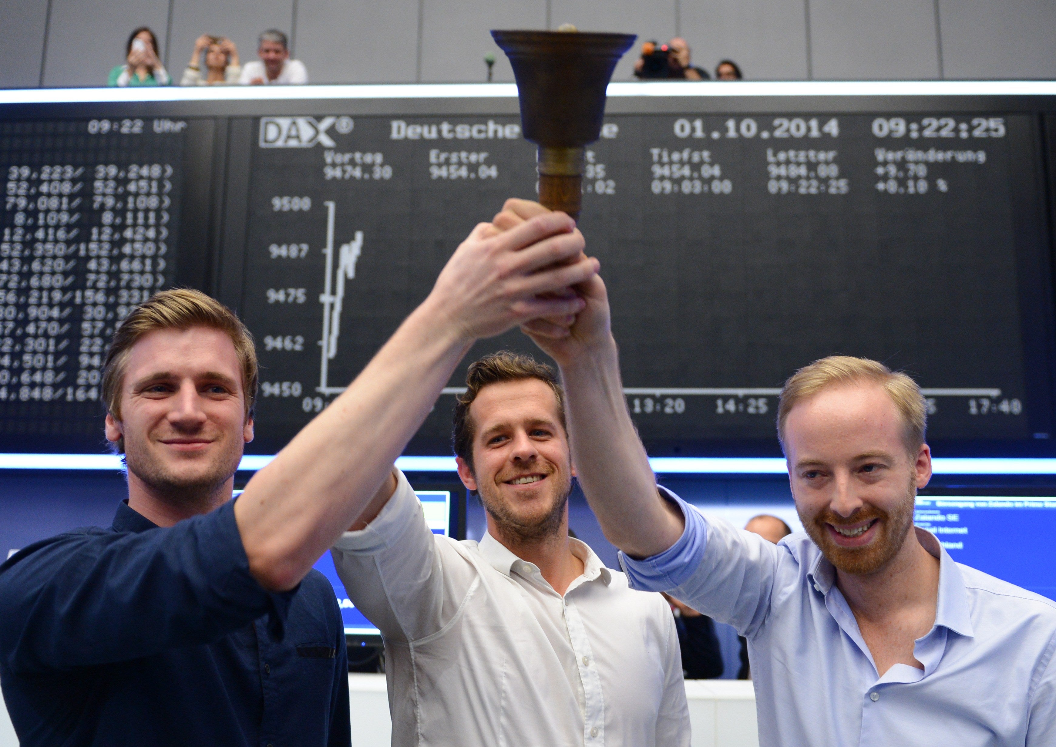 Zolando founders David Schneider, Robert Gentz and Rubin Ritter (right) at the stock exchange in 2014