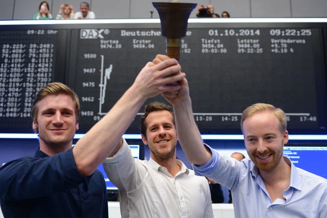 <p>Zolando founders David Schneider, Robert Gentz and Rubin Ritter (right) at the stock exchange in 2014</p>