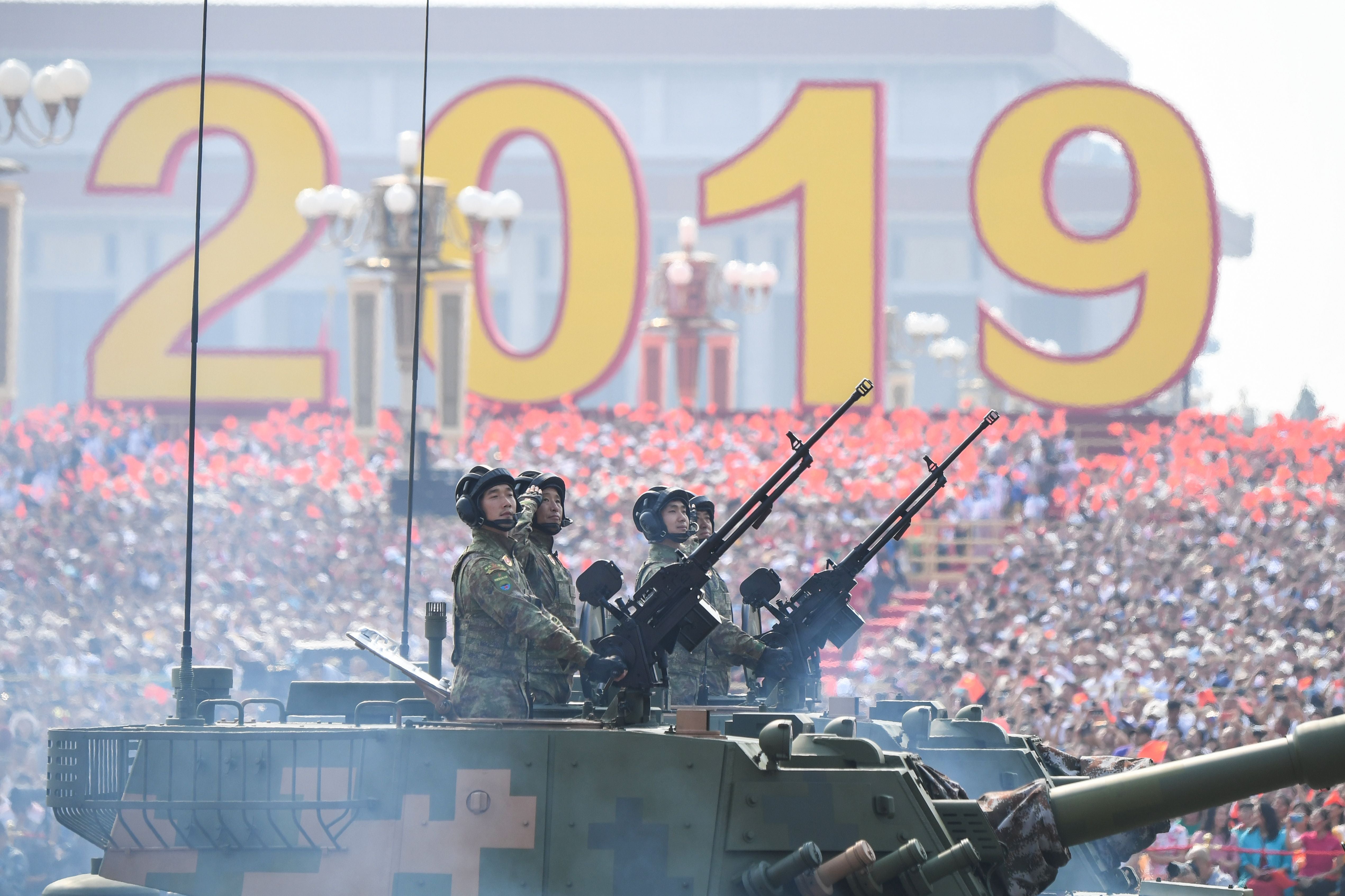 Military vehicles take part in a military parade at Tiananmen Square to mark the 70th anniversary of the founding of the Peoples Republic of China in October 2019