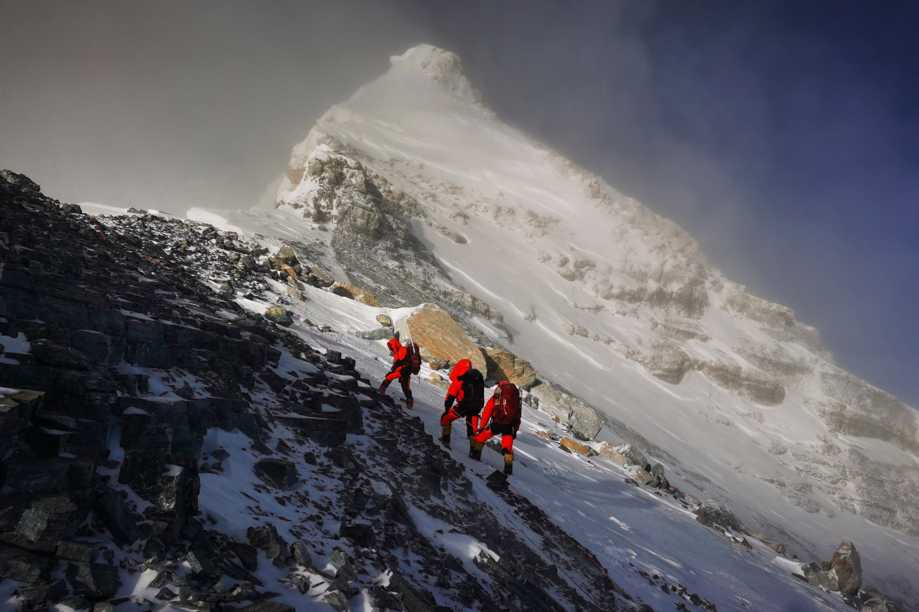 A Chinese surveying team head for the summit of Mount Everest in May