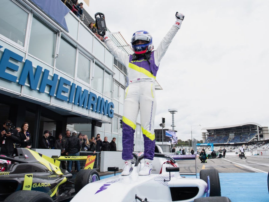 Briton Jamie Chadwick celebrates winning the first race of the W Series