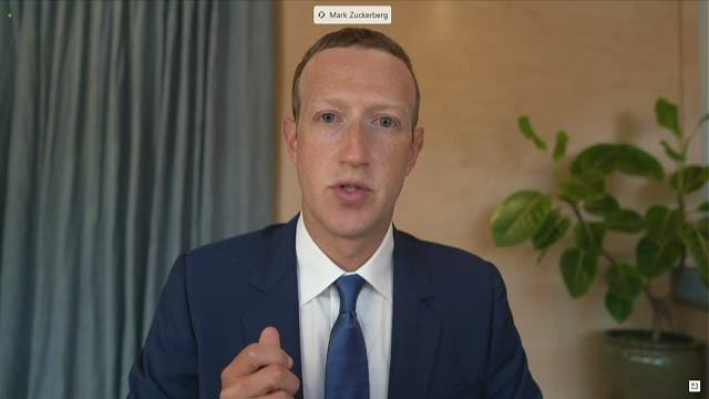<p>Zuckerberg met with the then culture secretary Matt Hancock at a tech conference in 2018</p>