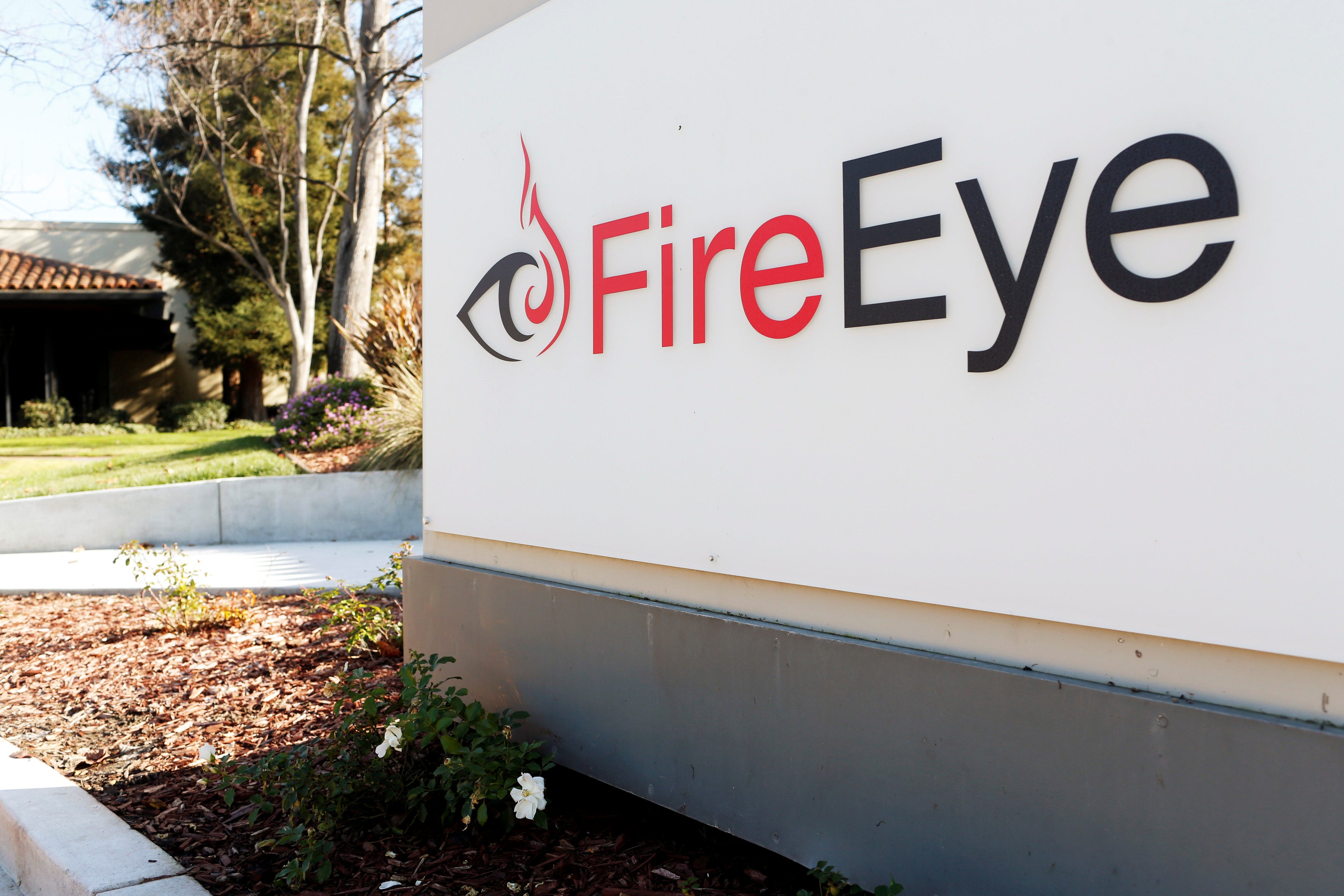 The FireEye logo is seen outside the company's offices in Milpitas, California