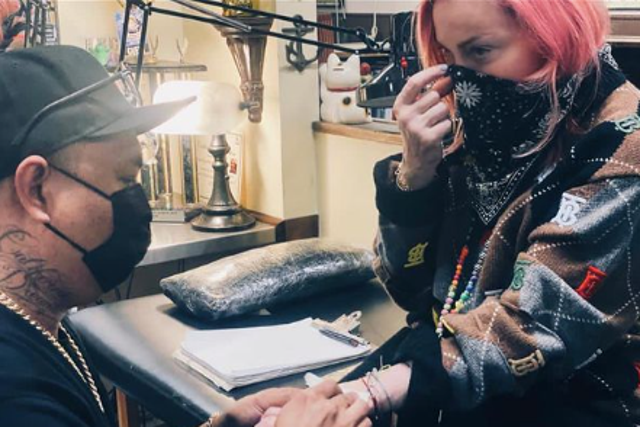 The ‘Like a Virgin’ singer gets her first ink