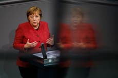 Merkel backs tougher virus curbs as German deaths hit record