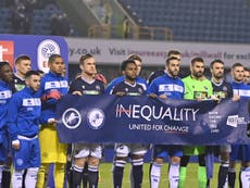 Millwall coach Rowett weighs in after banner gesture with QPR