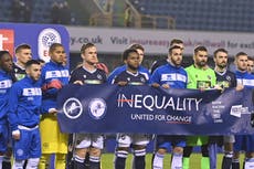 Millwall coach Rowett weighs in after banner gesture with QPR