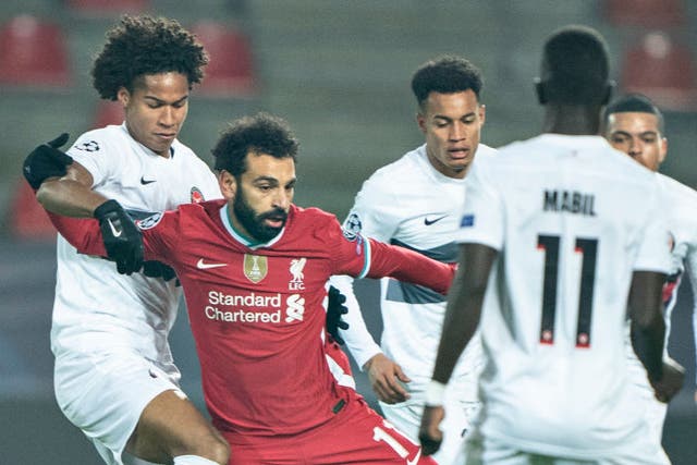 Mohamed Salah fights for the ball against Midtjylland