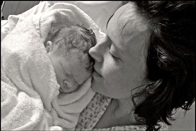 <p>Baby Kate Stanton-Davies pictured with her mother Rhiannon Davies in 2009. Her death has helped expose poor care at Shrewsbury and Telford Hospital Trust</p>