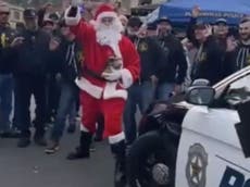 Anger as far-right Proud Boys crash Christmas toy giveaway
