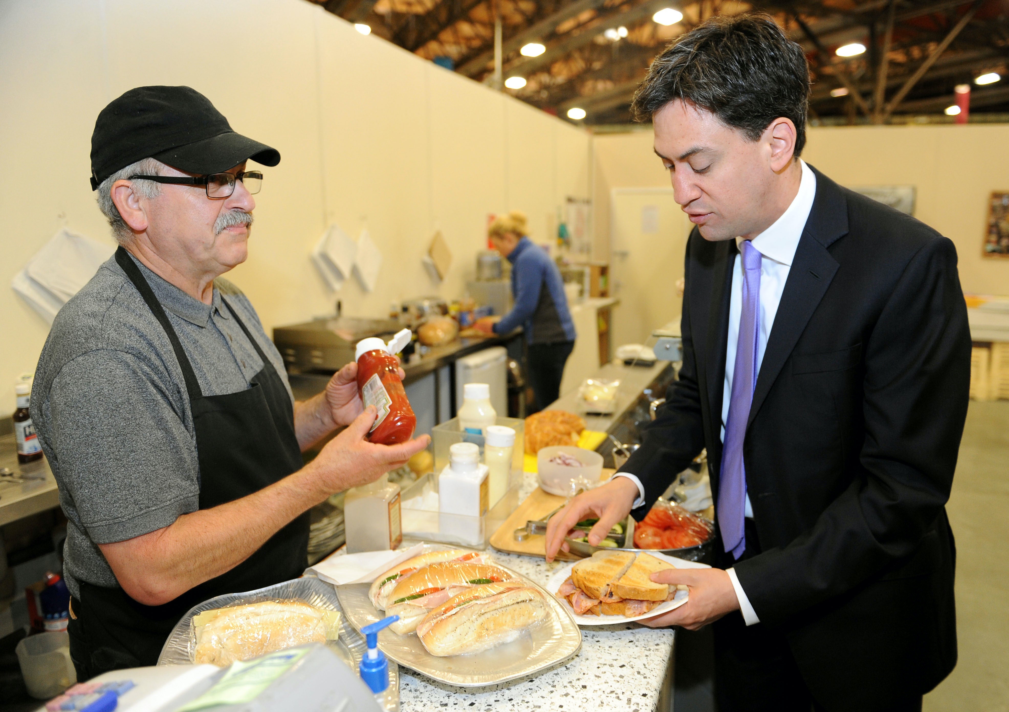 Ed Miliband prepares to eat a bacon sandwich
