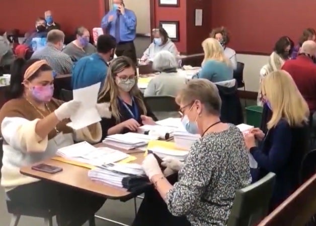 Workers tally ballots in Cobb County, Georgia following the 3 November elections