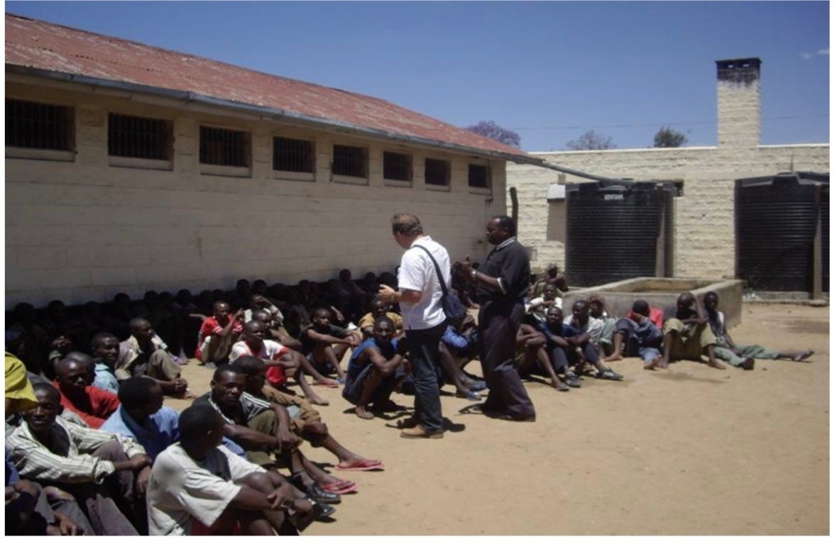 Rev Paul Cowley MBE speaking to men in a high security prison in Kenya