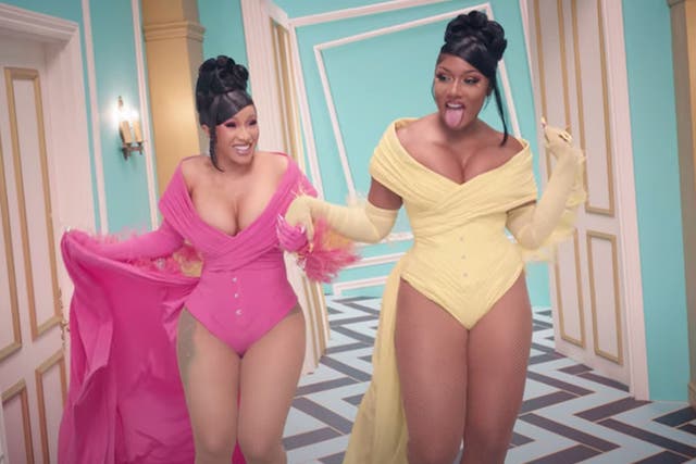 <p>Cardi B and Megan Thee Stallion (pictured in their WAP video) are both performing at the Grammys</p>