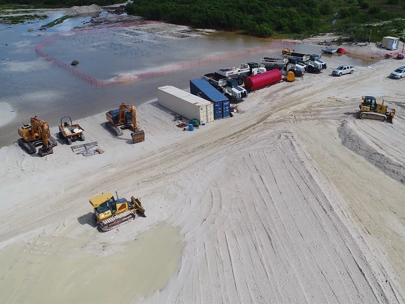 A construction site with heavy machinery at Barbuda’s Codrington Lagoon National Park, a designated wetland of international importance under the Ramsar Convention, on October 10, 2020