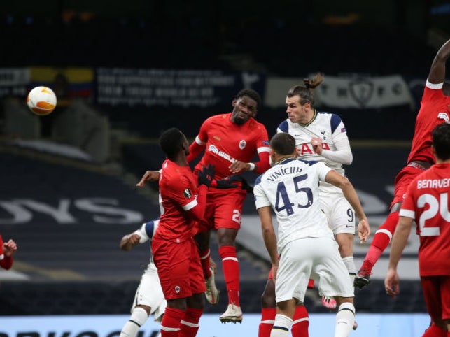 Bale directs a header towards goal