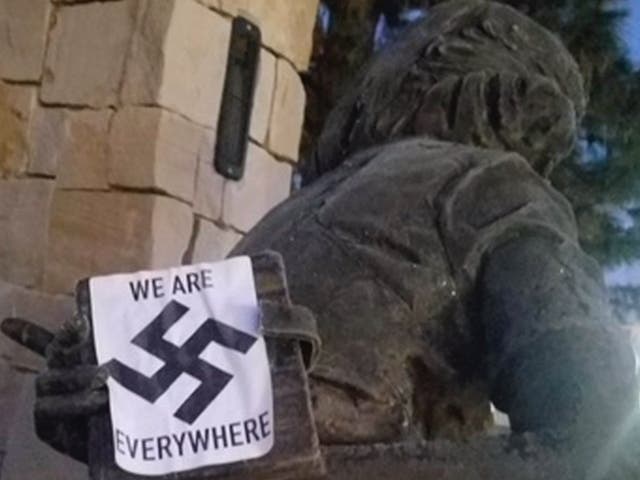 A swastika sticker is seen on a sculpture of Anne Frank in Boise, Idaho, on 8 December, 2020. 