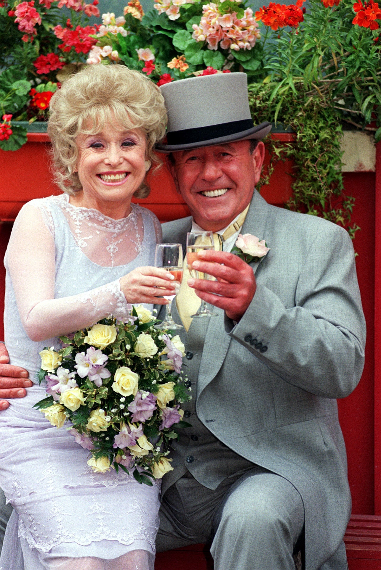 As Peggy Mitchell alongside Mike Reid’s Frank Butcher in 1999