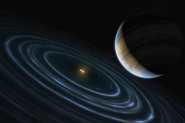 The 11-Jupiter-mass exoplanet called HD 106906 b, shown in this artist's illustration, occupies an unlikely orbit around a double star 336 light-years away