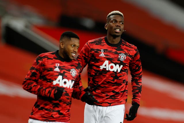 Manchester United midfielder Paul Pogba (right)