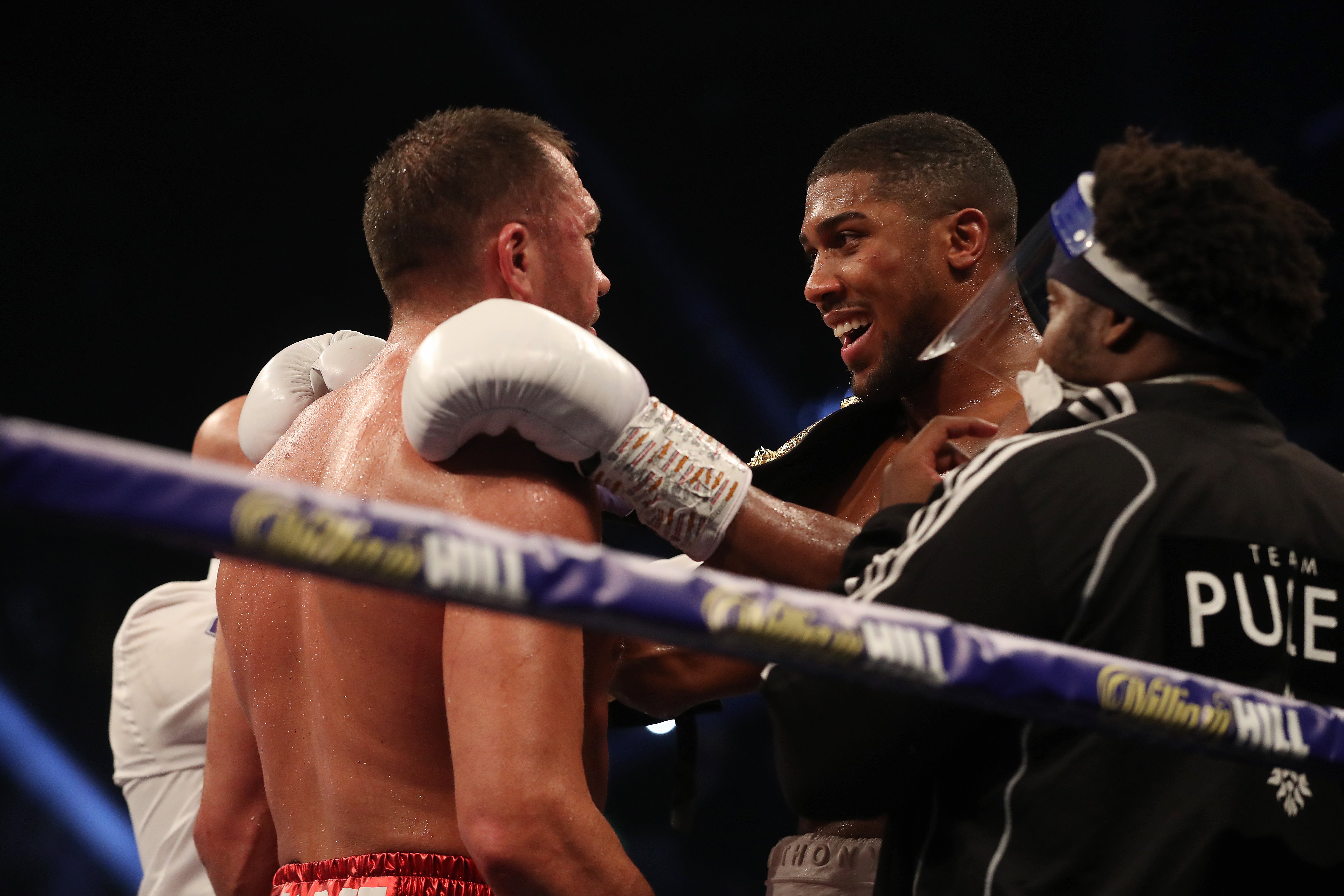 Joshua embraces Pulev after victory