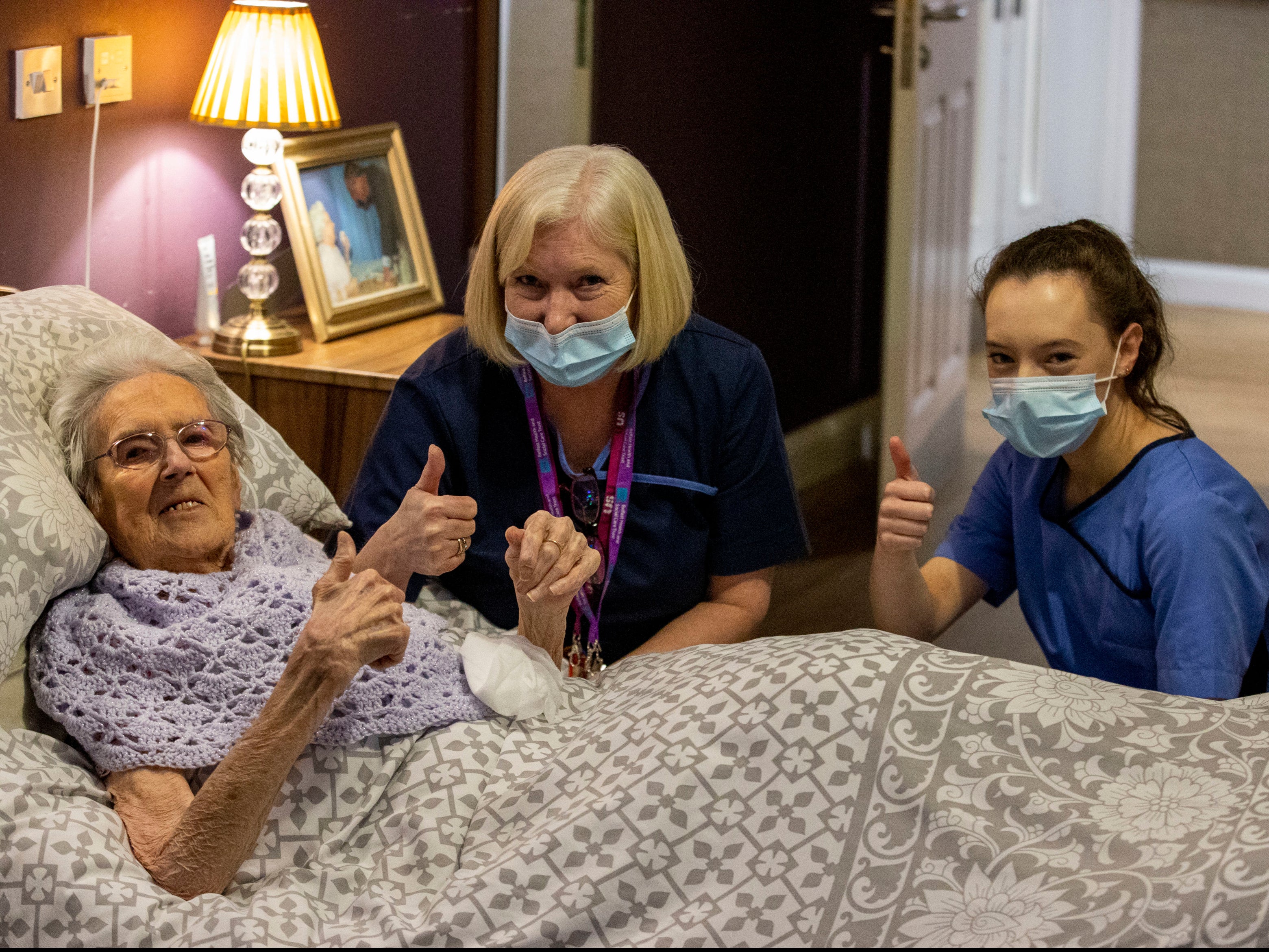 Ethel Sinclair, 100, was among residents to receive the vaccine at a care home in north Belfast, Northern Ireland, earlier this week