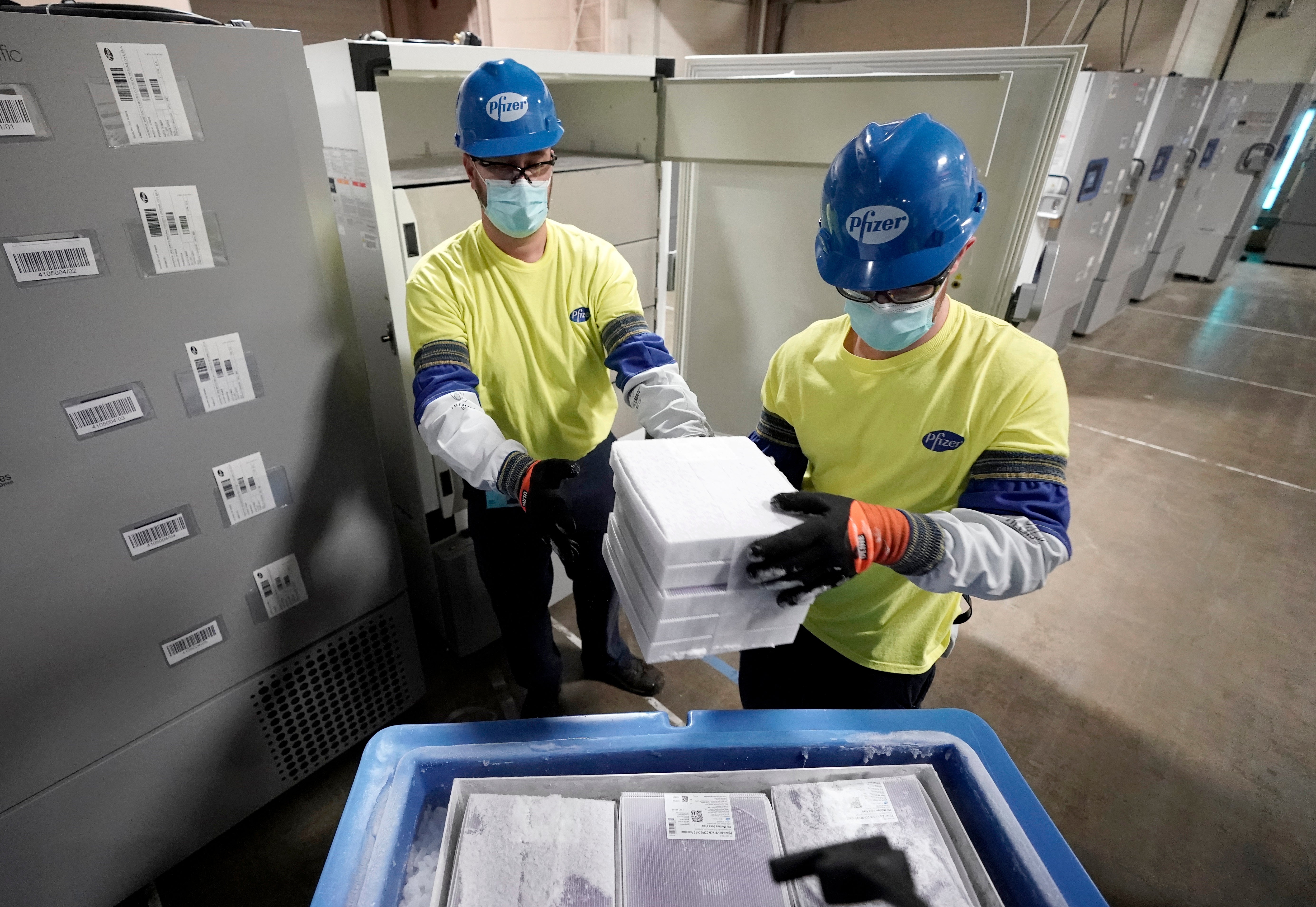 Boxes containing the Pfizer-BioNTech Covid-19 vaccine are prepared to be shipped