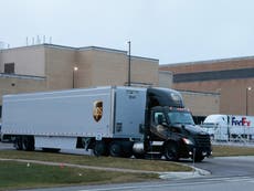 Emotional video shows crowds cheering Covid vaccine trucks