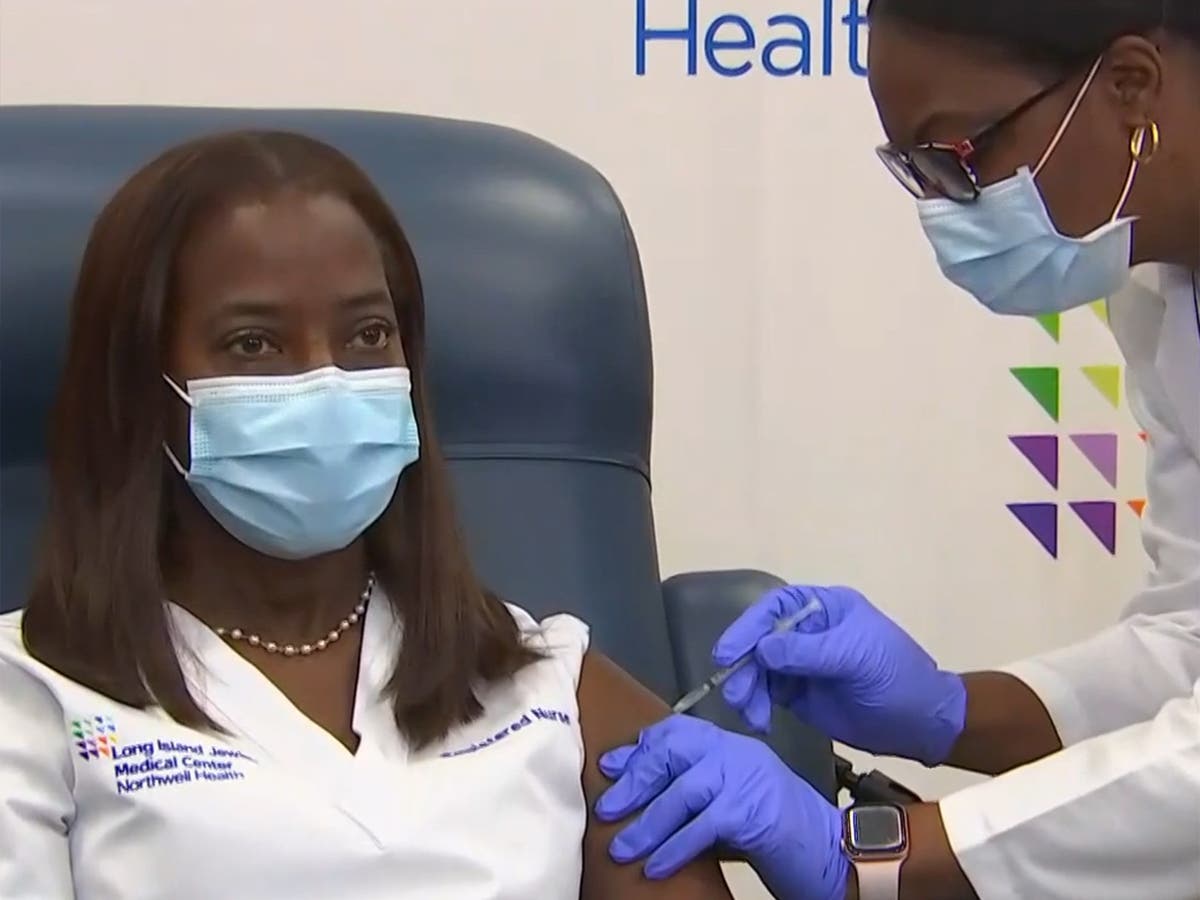 New York nurse becomes first American to publicly receive Covid vaccine | The Independent