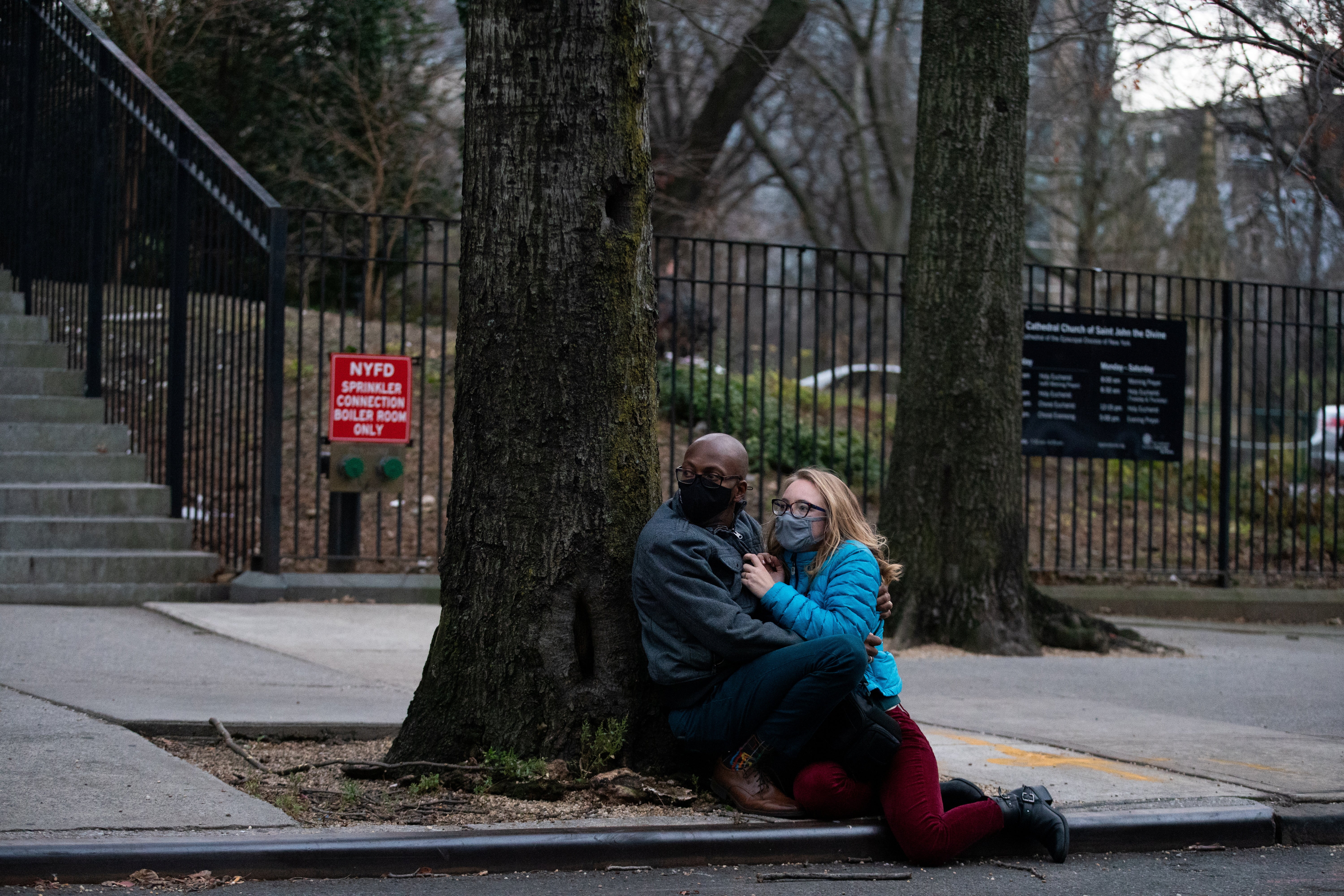 Concert-goers take cover during the shootout in front of the Cathedral of St John the Divine in New York City