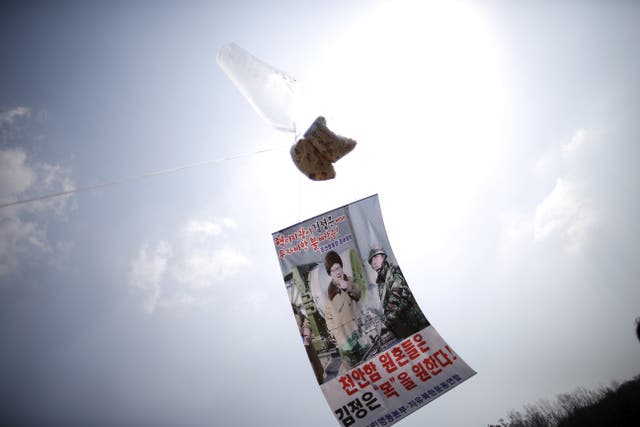 <p>FILE PHOTO: A balloon containing leaflets denouncing North Korean leader Kim Jong Un is seen near the demilitarised zone separating the two Koreas in Paju, South Korea</p>