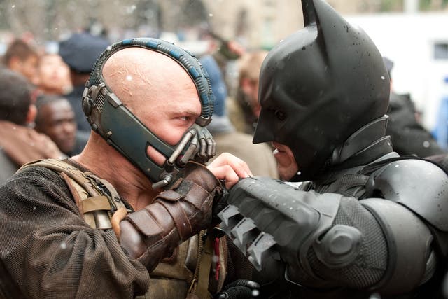 Bane (Tom Hardy) grapples with Batman in Christopher Nolan’s The Dark Knight Rises