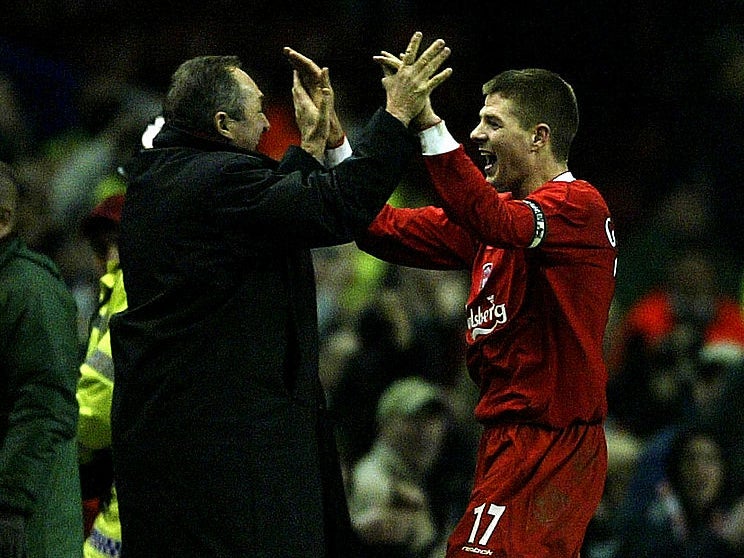 Steven Gerrard celebrates with Gerard Houllier after scoring in the Uefa Cup