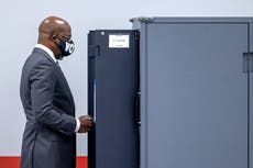 Raphael Warnock fights Kelly Loeffler’s racially loaded campaign
